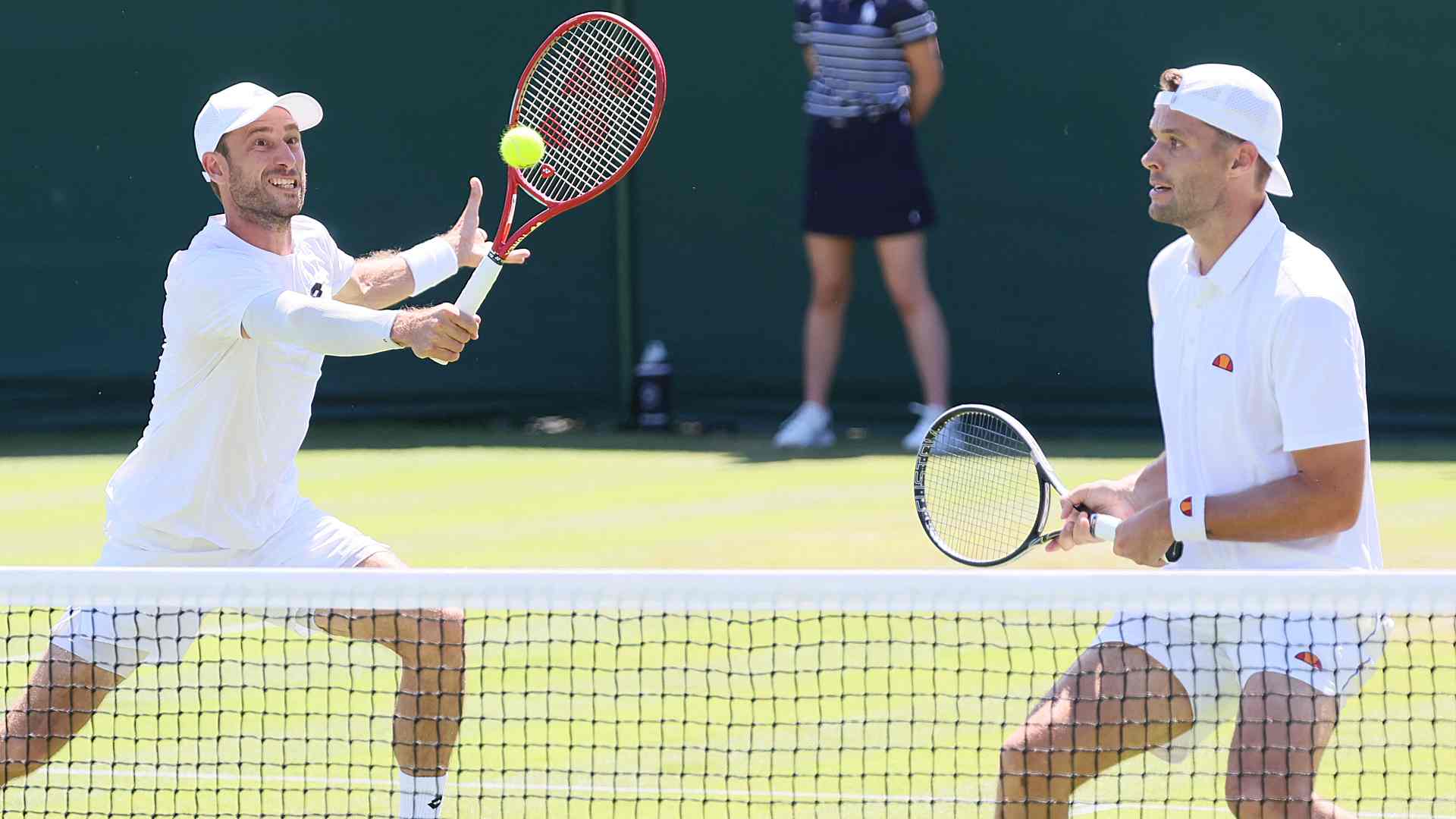 <a href='https://www.atptour.com/en/players/sander-gille/gd32/overview'>Sander Gille</a> and <a href='https://www.atptour.com/en/players/sem-verbeek/v09l/overview'>Sem Verbeek</a> in action on Saturday at <a href='https://www.atptour.com/en/tournaments/wimbledon/540/overview'>Wimbledon</a>.