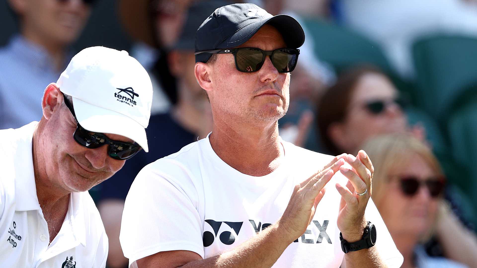 Lleyton Hewitt watching Cruz Hewitt in the Wimbledon Boys' Singles final.