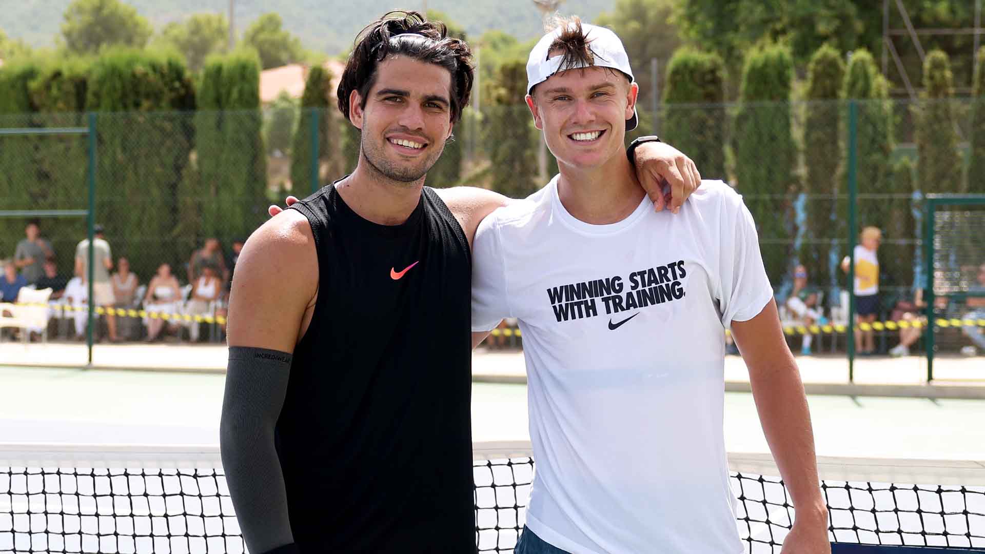 Carlos Alcaraz and Holger Rune practise together on Monday in Murcia. 
