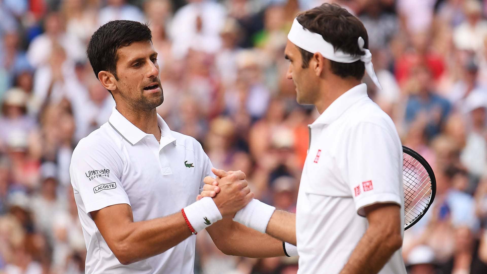 Novak Djokovic and Roger Federer after their epic 2019 Wimbledon final.