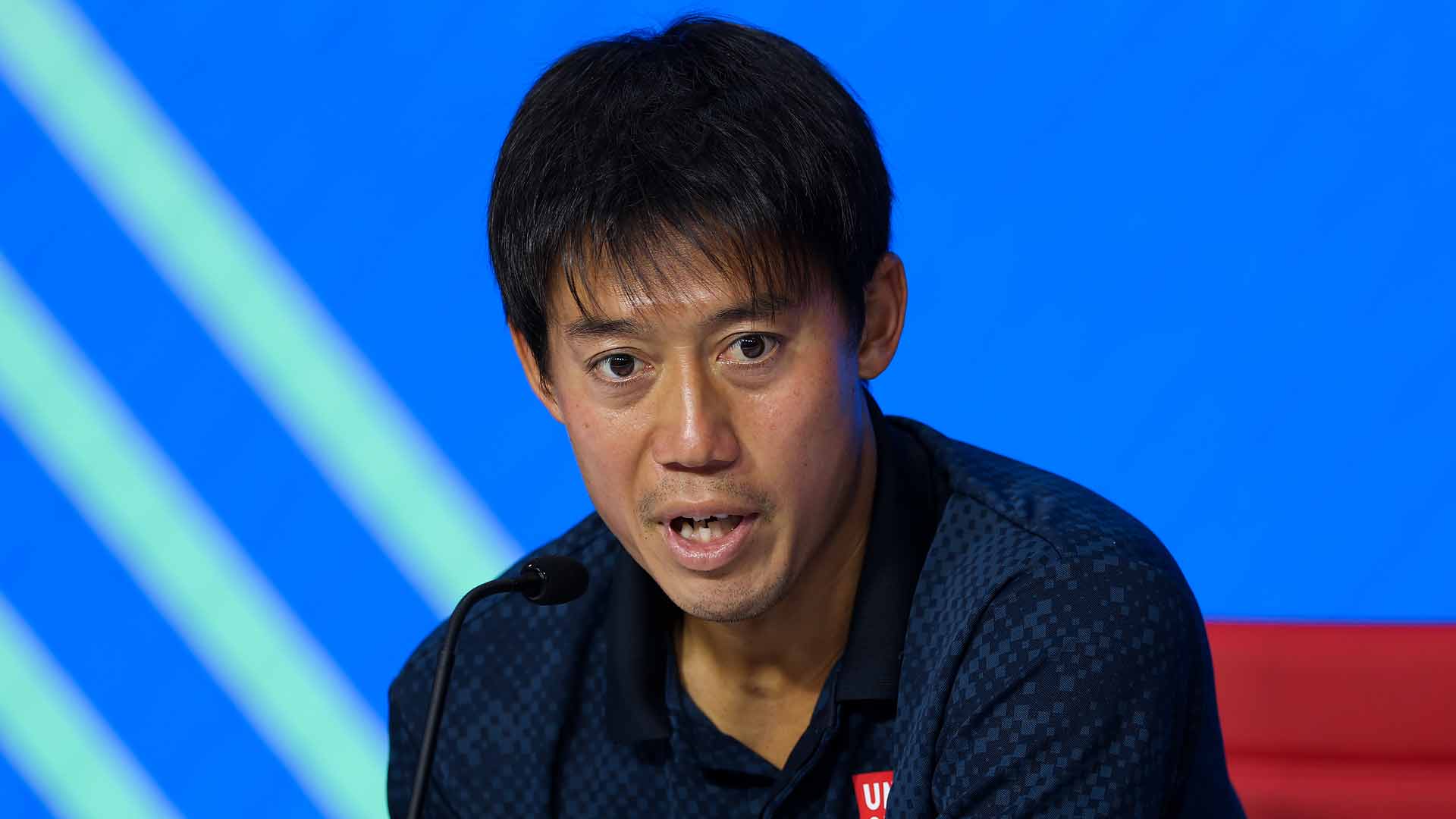 Kei Nishikori speaks to the media after falling in the third round of US Open qualifying to Rei Sakamoto.
