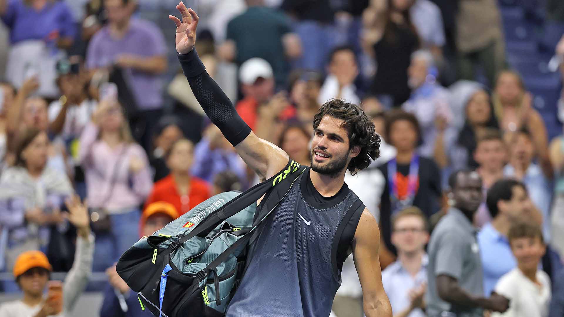 Carlos Alcaraz salutes the crowd after losing a five-set thriller to home hope Ben Shelton at the US Open.