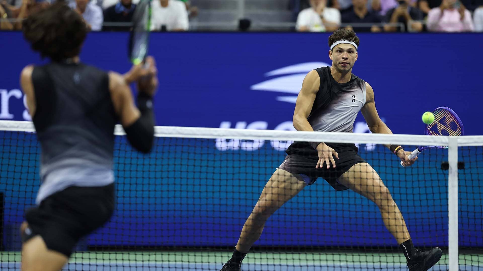 Carlos Alcaraz and Ben Shelton in action during their quarter-final clash at the 2026 US Open.
