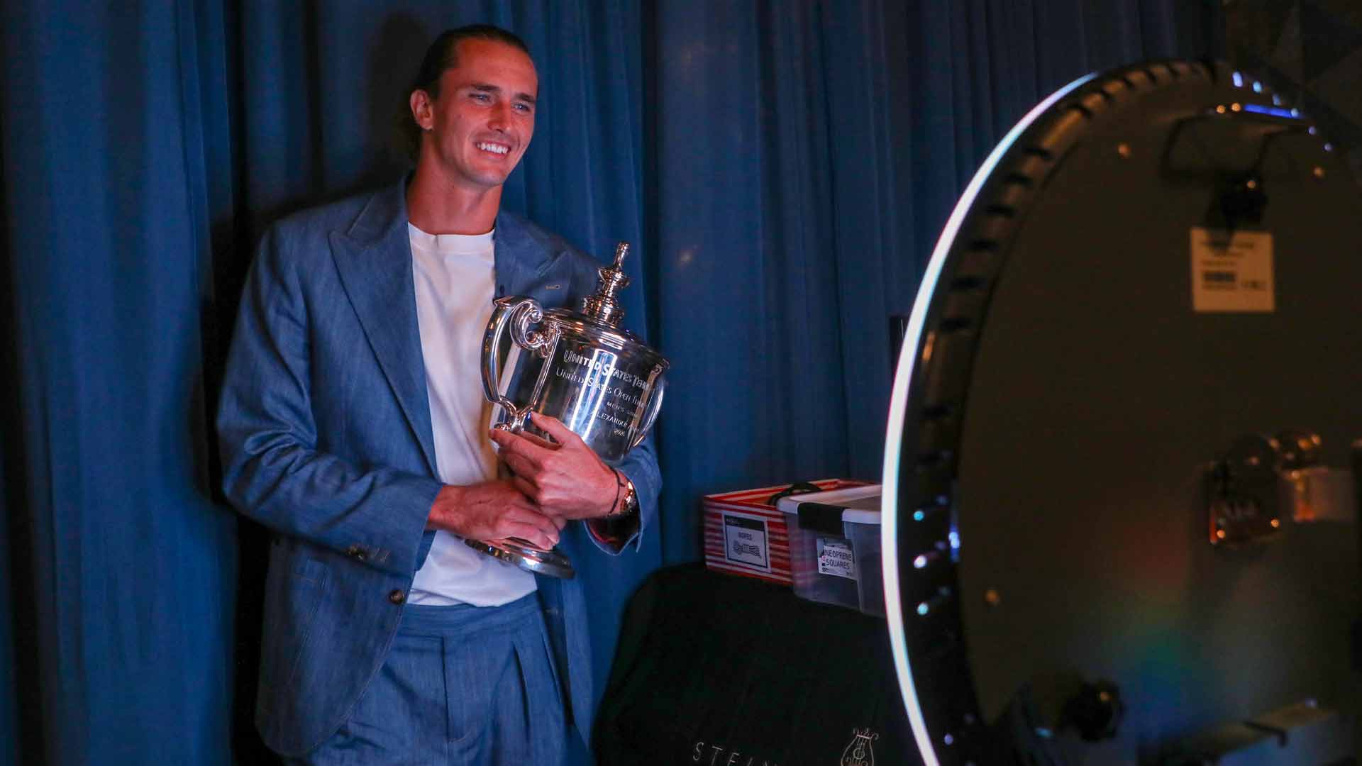 <a href='https://www.atptour.com/en/players/alexander-zverev/z355/overview'>Alexander Zverev</a>, the 2026 <a href='https://www.atptour.com/en/tournaments/us-open/560/overview'>US Open</a> men's singles champion, with the trophy.