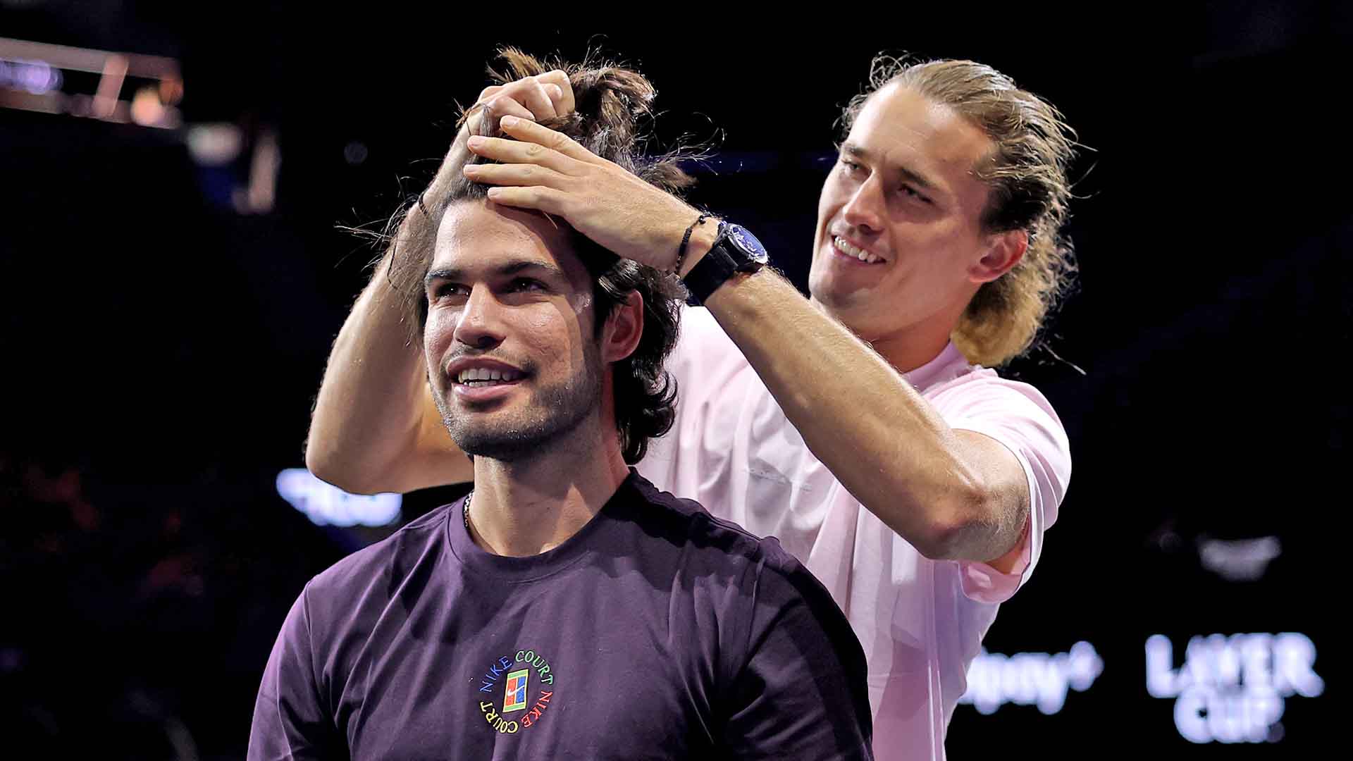 Carlos Alcaraz and Alexander Zverev enjoy a light-hearted moment during Thursday's practice session at The O2. 