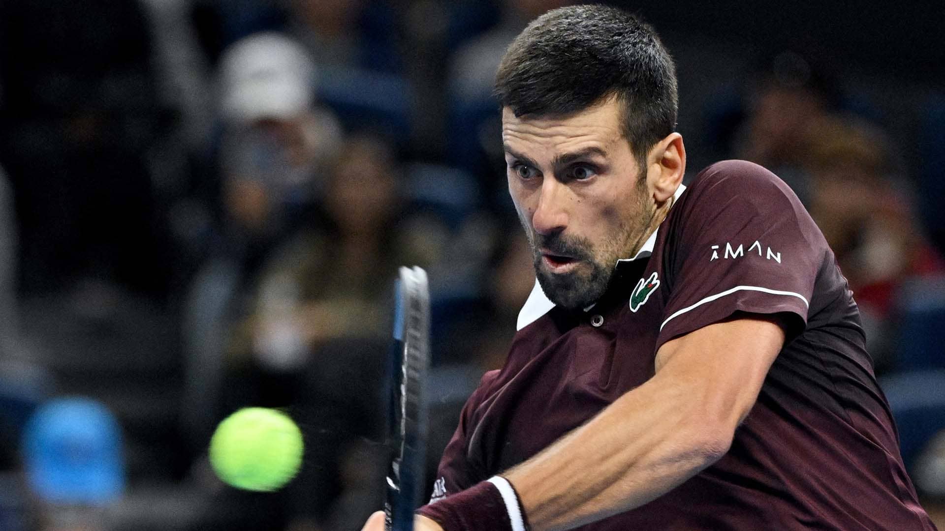 Djokovic reaches Beijing final after Medvedev defaulted