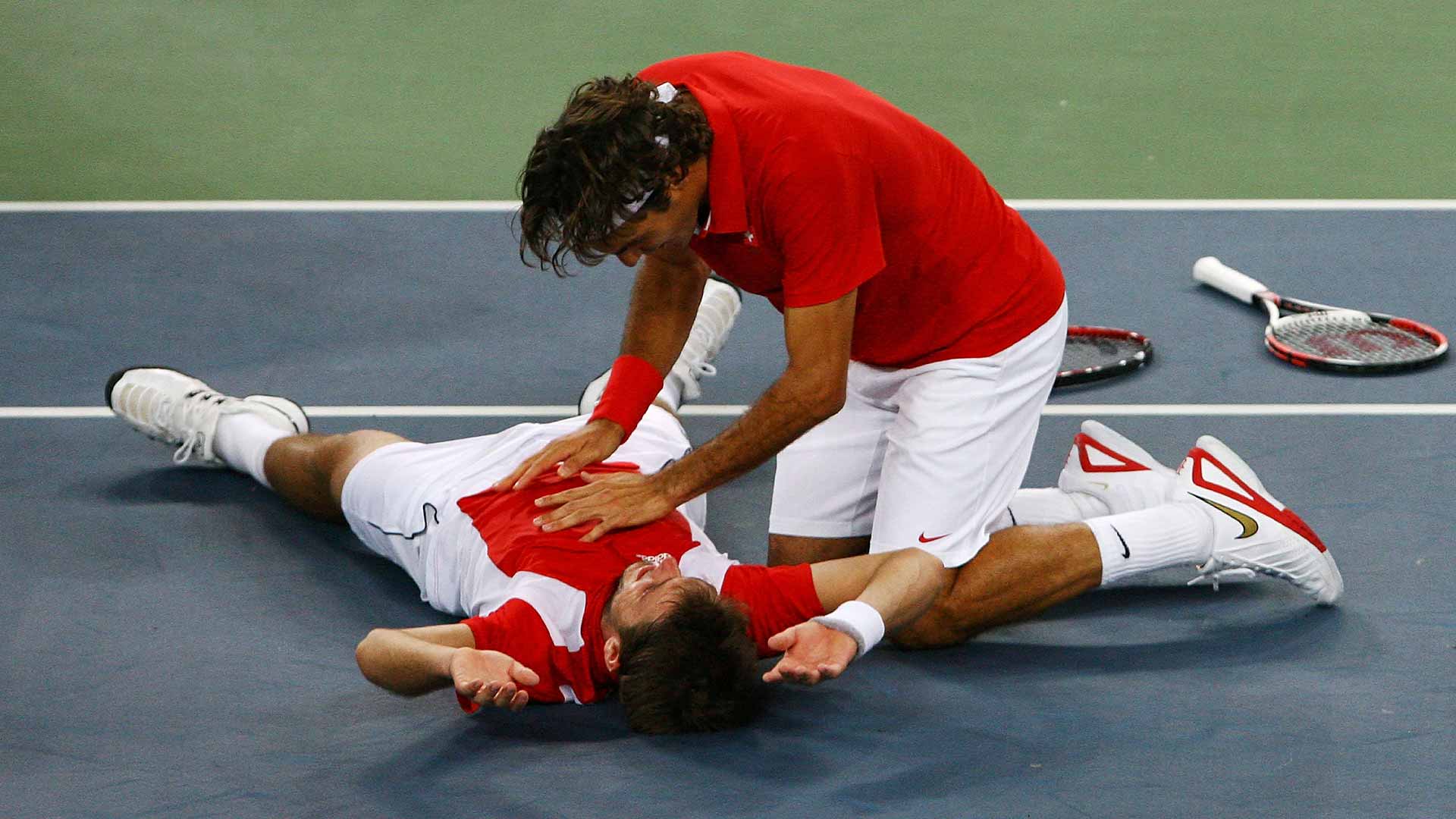 <a href='https://www.atptour.com/en/players/stan-wawrinka/w367/overview'>Stan Wawrinka</a> and <a href='https://www.atptour.com/en/players/roger-federer/f324/overview'>Roger Federer</a> celebrate their 2008 Olympics gold medal triumph.