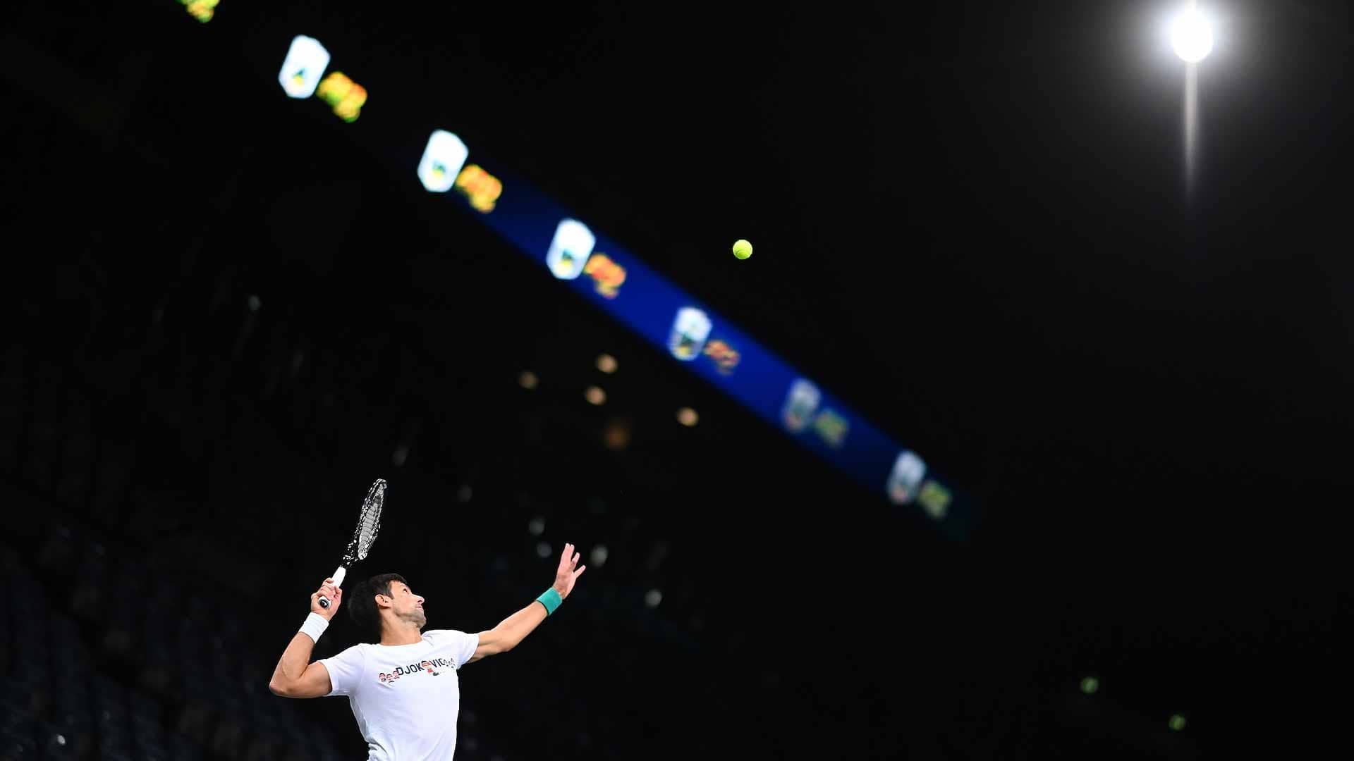 Novak Djokovic serves at the 2021 Rolex Paris Masters