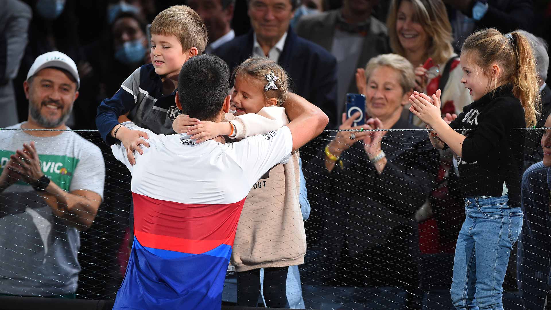 Novak Djokovic celebrates with his children after winning the 2021 Rolex Paris Masters