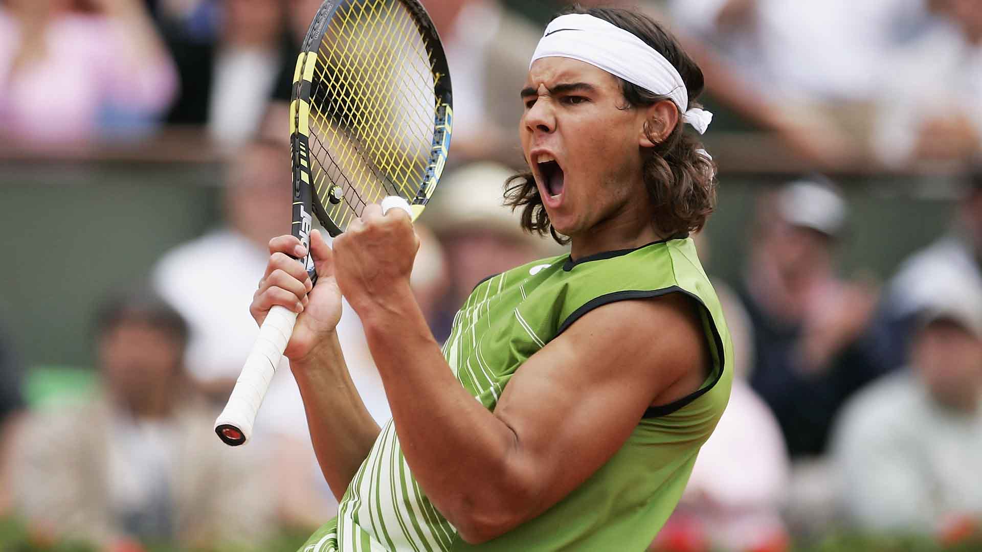 Rafael Nadal defeats Mariano Puerta of Argentina 6-7(6), 6-3, 6-1, 7-5 to win his first Grand Slam title at Roland Garros in 2005.