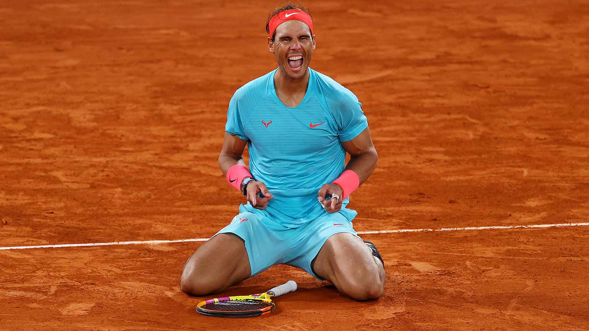 Rafael Nadal overpowers Novak Djokovic 6-0, 6-2, 7-5 at Roland Garros to match Roger Federer’s all-time record haul of 20 Grand Slam crowns.