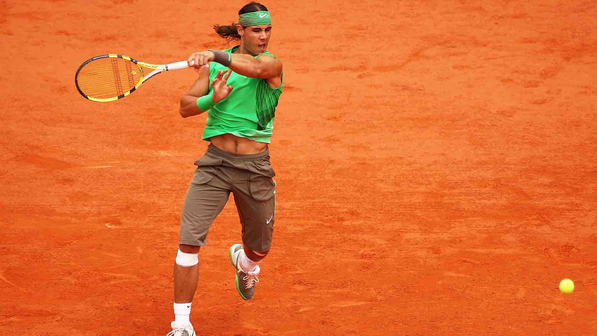 Rafael Nadal races past Roger Federer 6-1, 6-3, 6-0 to win Roland Garros without dropping a set for the first time.